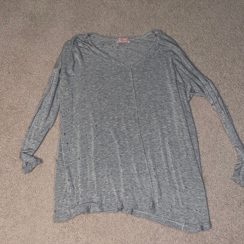 Grey long sleeve with small holes throughout